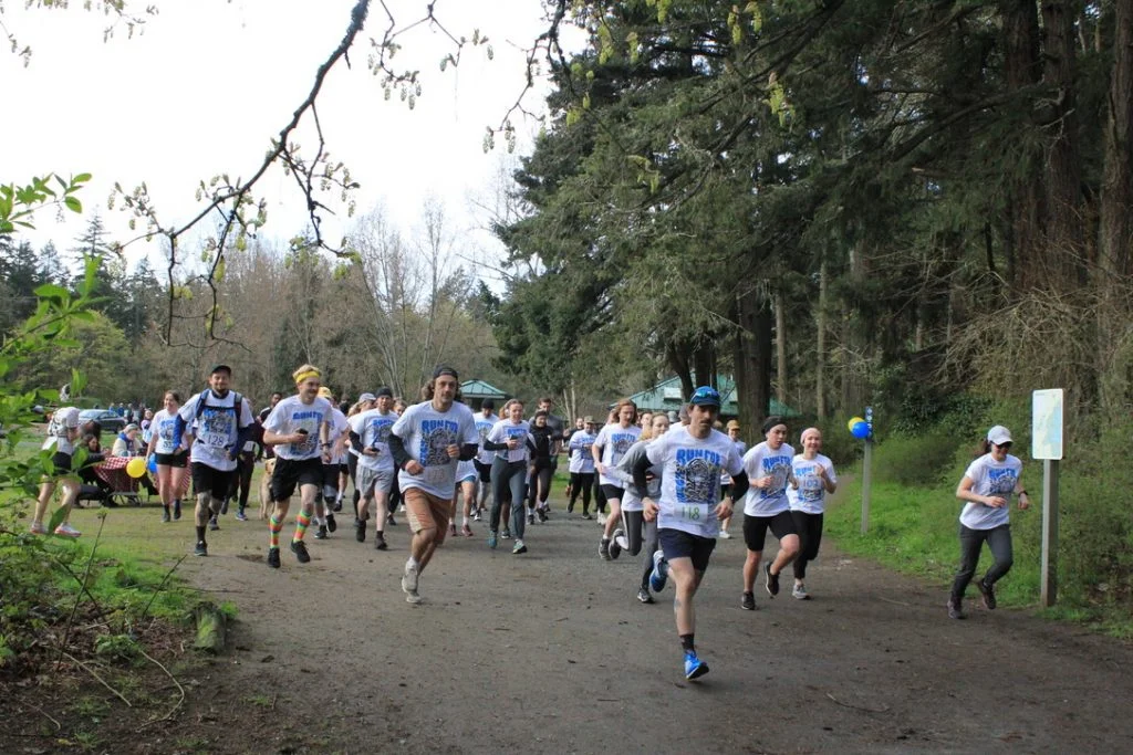 A group of runners participating in the Run for FUNds race at Elk Lake Park on April 2, 2022