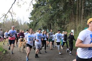 A group of runners participating in the Run for FUNds race at Elk Lake Park on April 2, 2022